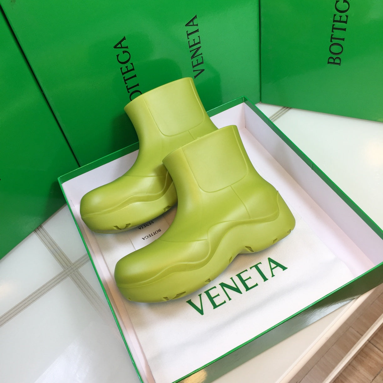 BOTTEGA VENETA PUDDLE ANKLE BOOT IN OLIVE GREEN RUBBER