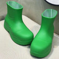 BOTTEGA VENETA PUDDLE ANKLE BOOT IN EMERALD GREEN RUBBER