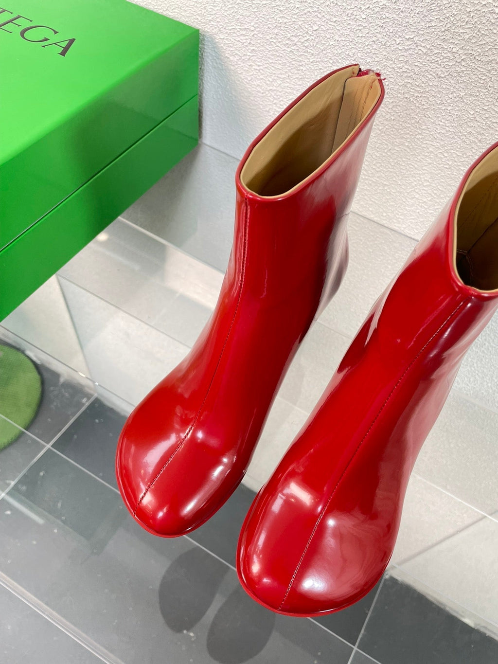 BOTTEGA VENETA ATOMIC ANKLE BOOT IN RUBY RED CALFSKIN 75 MM