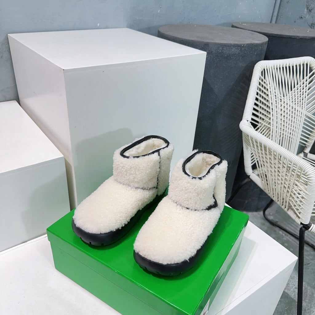 BOTTEGA VENETA MINI ANKLE BOOT IN WHITE SHEARLING WITH BLACK ULTRA LIGHTWEIGHT RUBBER OUTSOLE