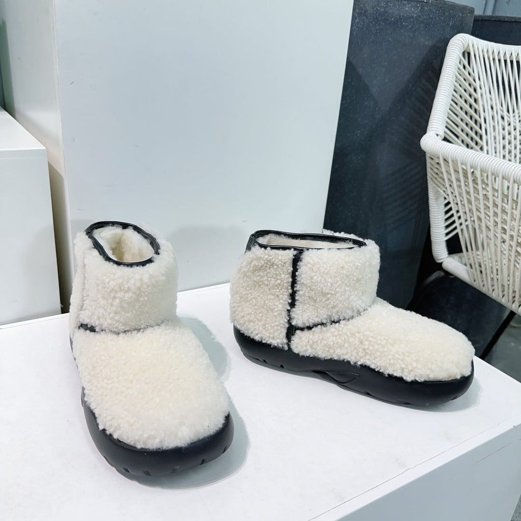 BOTTEGA VENETA MINI ANKLE BOOT IN WHITE SHEARLING WITH BLACK ULTRA LIGHTWEIGHT RUBBER OUTSOLE