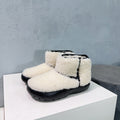 BOTTEGA VENETA MINI ANKLE BOOT IN WHITE SHEARLING WITH BLACK ULTRA LIGHTWEIGHT RUBBER OUTSOLE