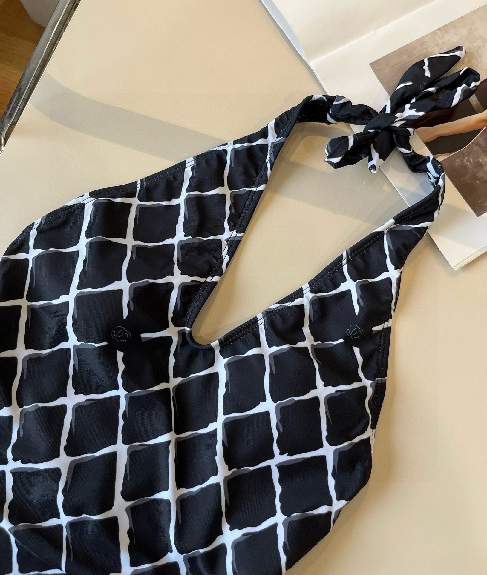 CHANEL BIKINI SWIMSUIT SET IN WHITE CHECKERED PRINT ON BLACK BACKGROUND 624545