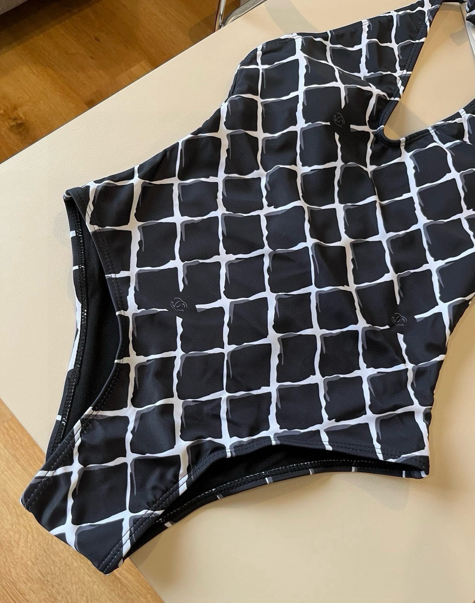 CHANEL BIKINI SWIMSUIT SET IN WHITE CHECKERED PRINT ON BLACK BACKGROUND 624545