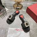 ESPADRILLES MULES IN BLACK RAFFIA