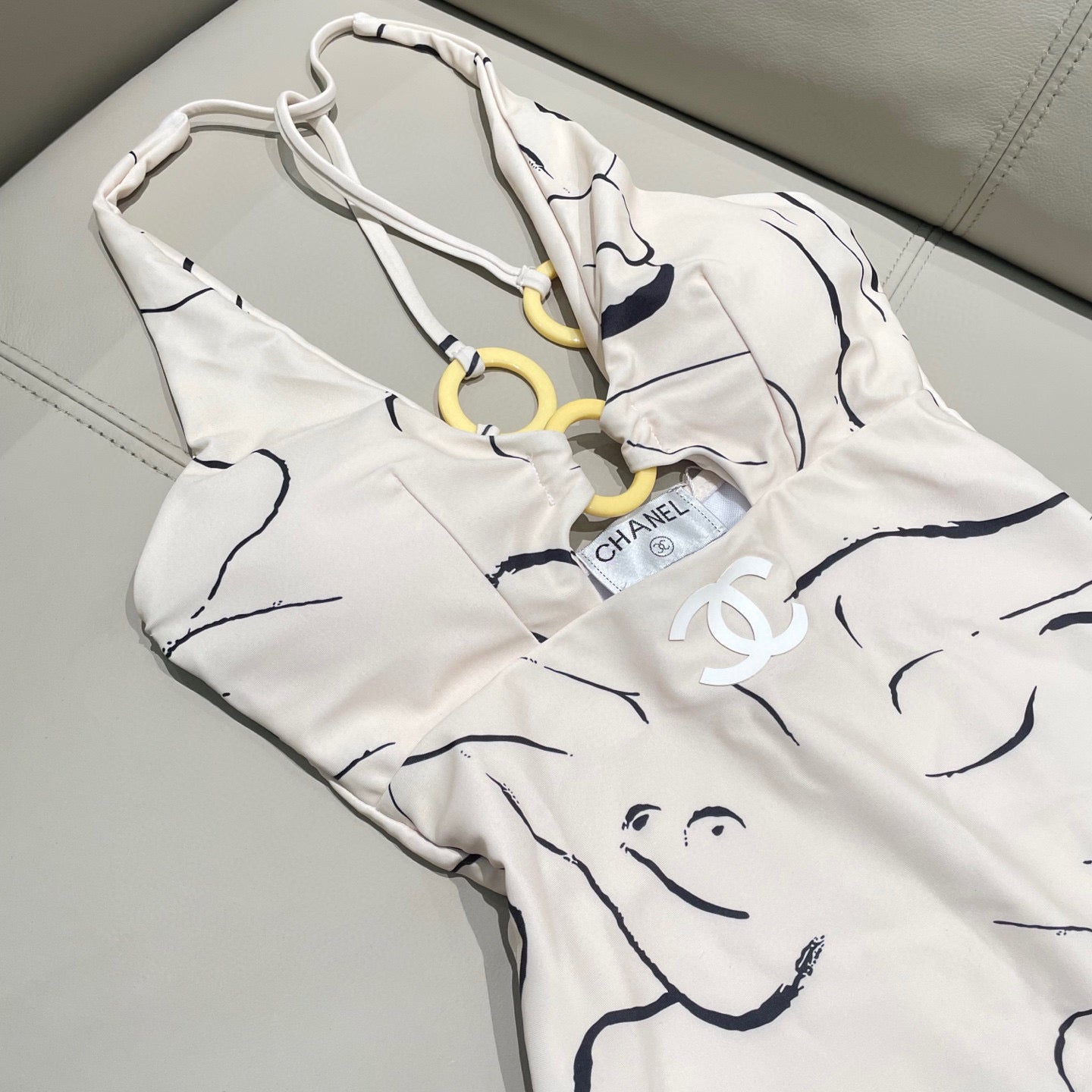 CHANEL BIKINI SWIMSUIT SET IN CREAMY WHITE MIXED WITH CURVED BLACK DETAIL 608919
