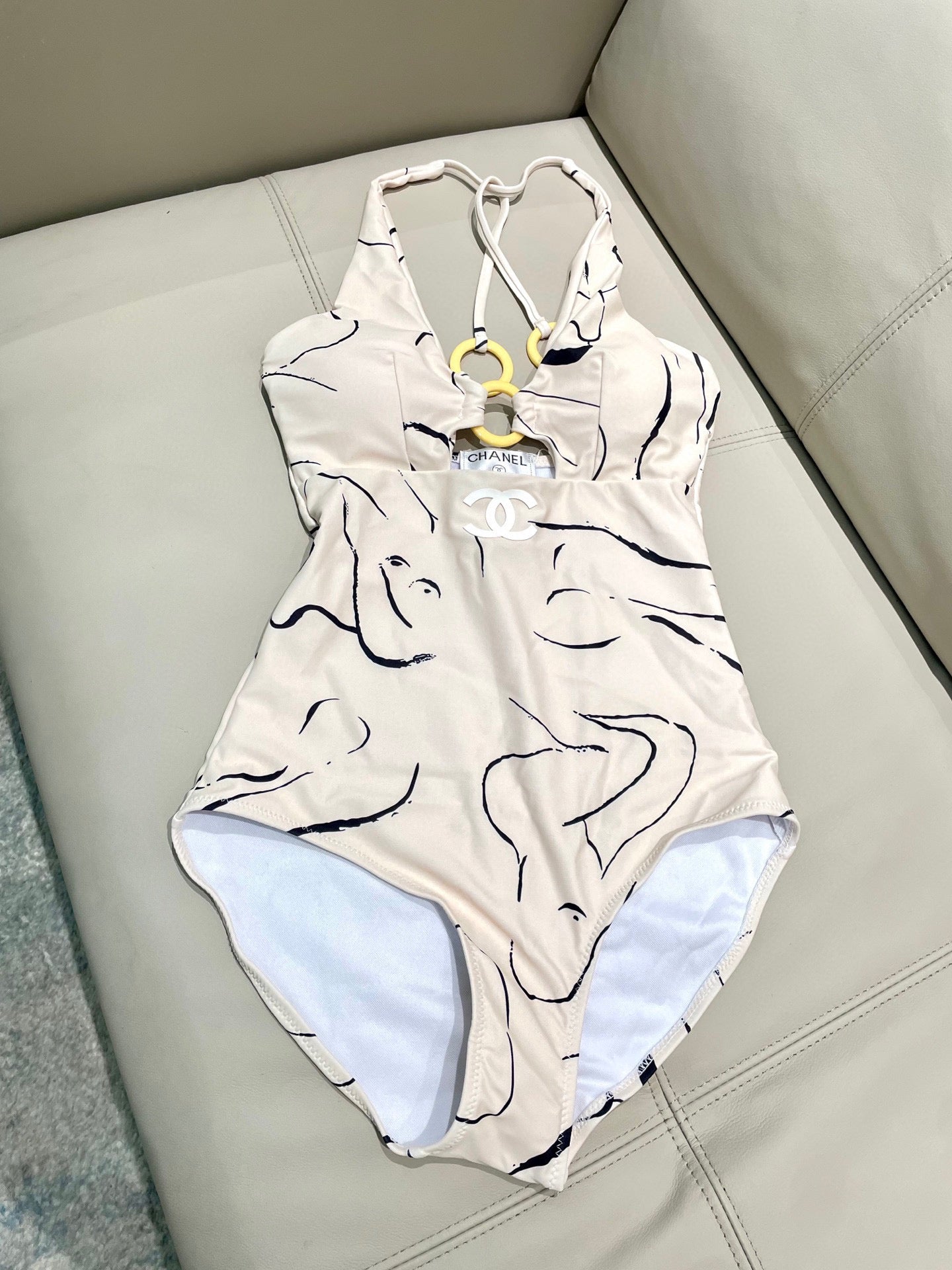 CHANEL BIKINI SWIMSUIT SET IN CREAMY WHITE MIXED WITH CURVED BLACK DETAIL 608919