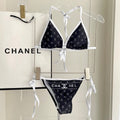 CHANEL BIKINI SWIMSUIT SET IN BLACK AND WHITE TRIM WHITE LOGO PRINTED 608921