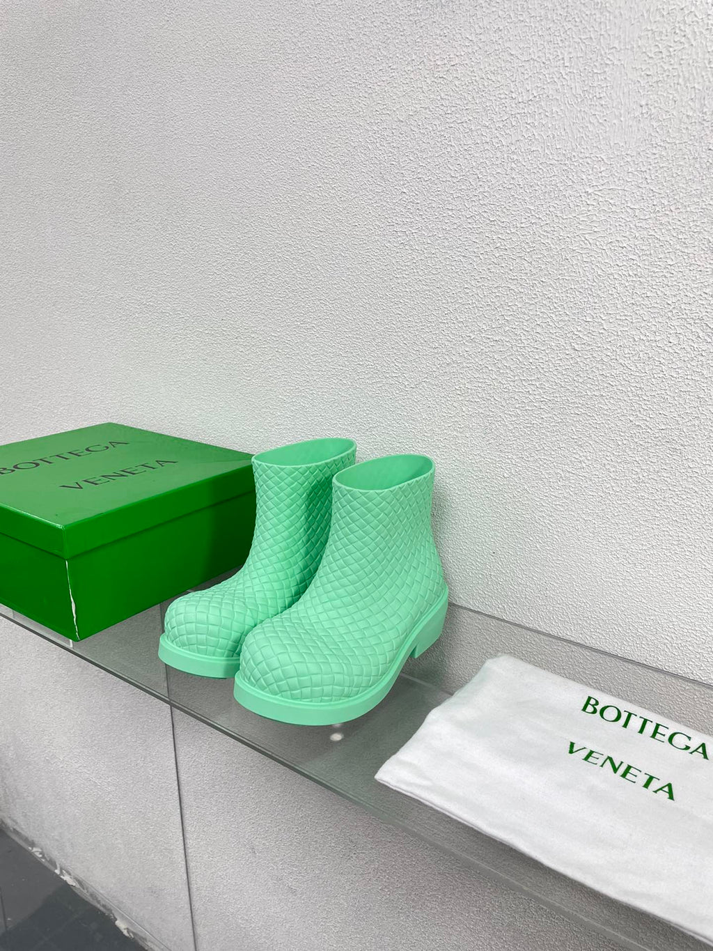 BOTTEGA VENETA FIREMAN BOOTS IN GREEN MINT RUBBER WITH ICONIC INTRECCIO MOTIF