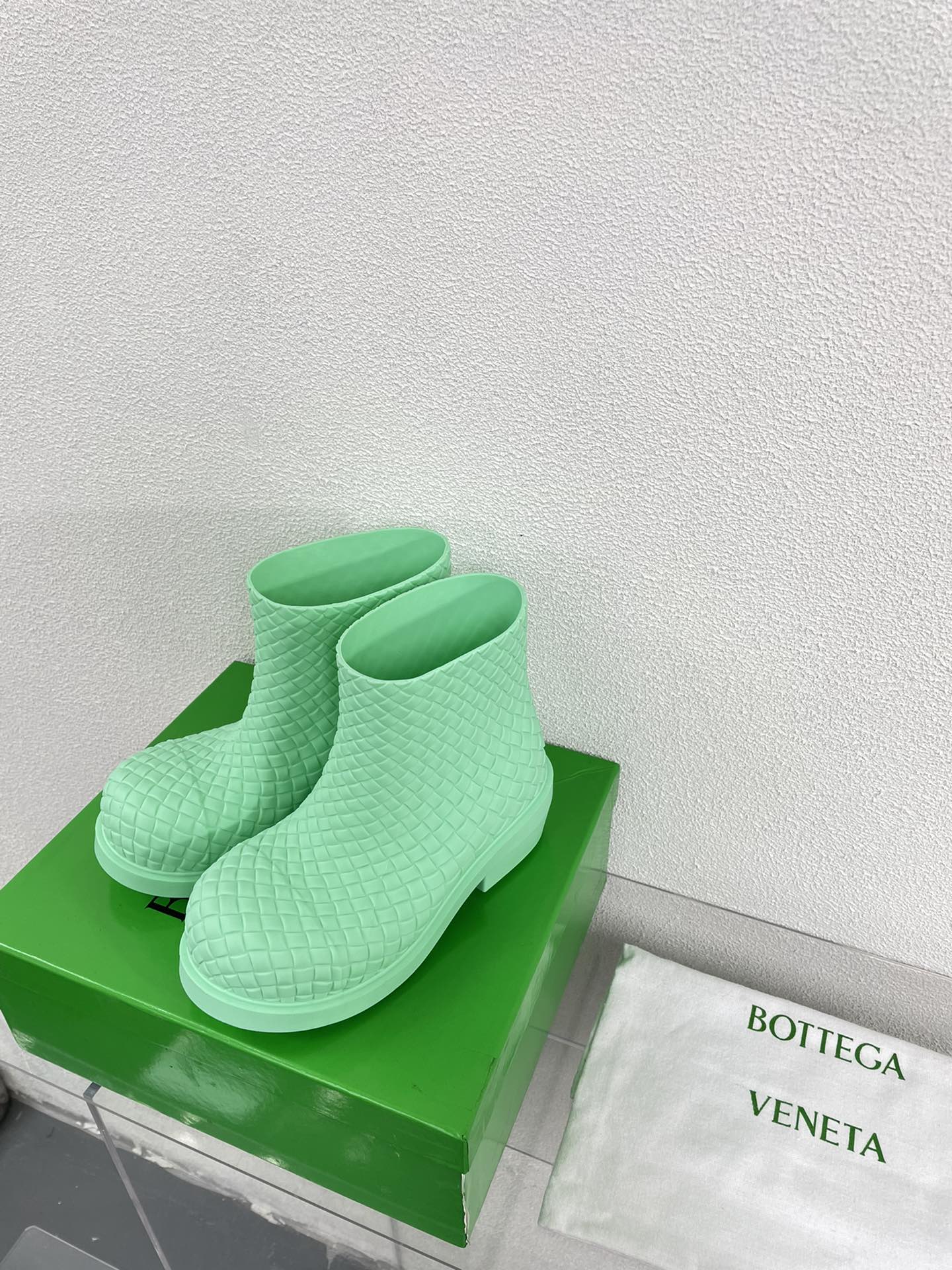 BOTTEGA VENETA FIREMAN BOOTS IN GREEN MINT RUBBER WITH ICONIC INTRECCIO MOTIF