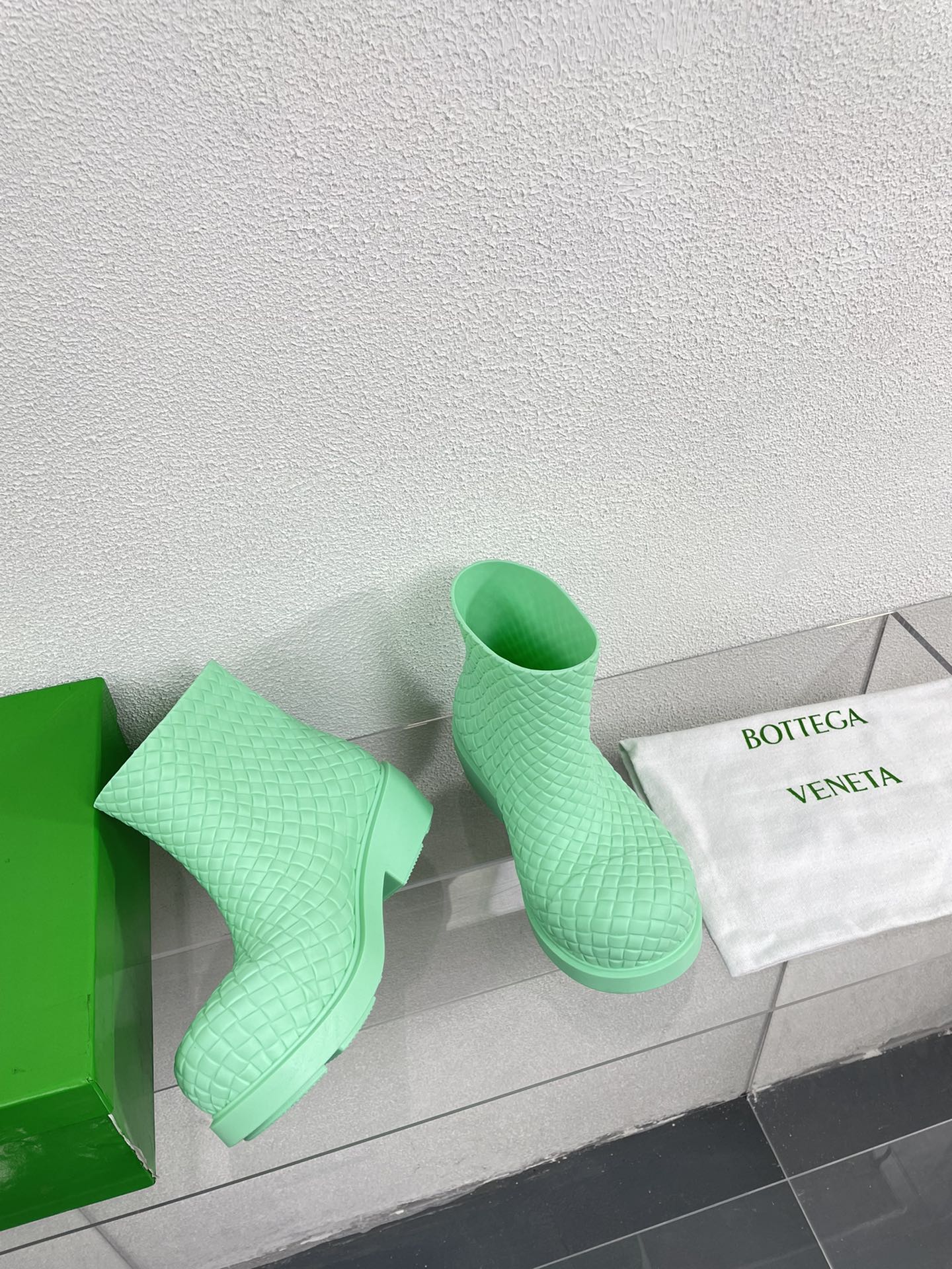 BOTTEGA VENETA FIREMAN BOOTS IN GREEN MINT RUBBER WITH ICONIC INTRECCIO MOTIF