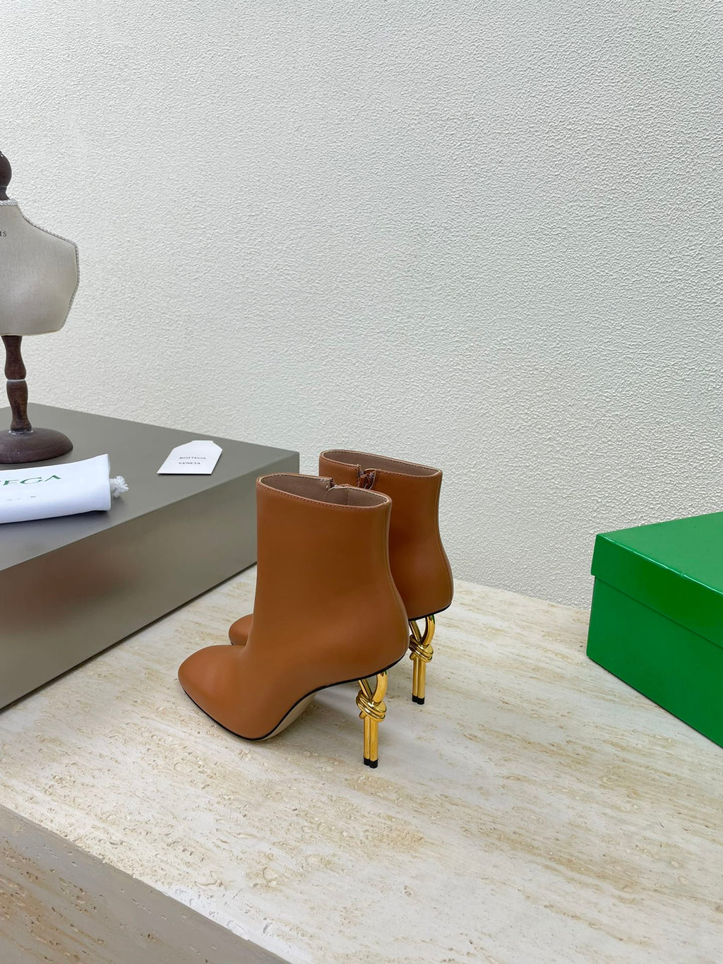 BOTTEGA VENETA KNOT ANKLE BOOT IN BRONZE BROWN CALFSKIN WITH GOLD METAL HEEL 9 CM